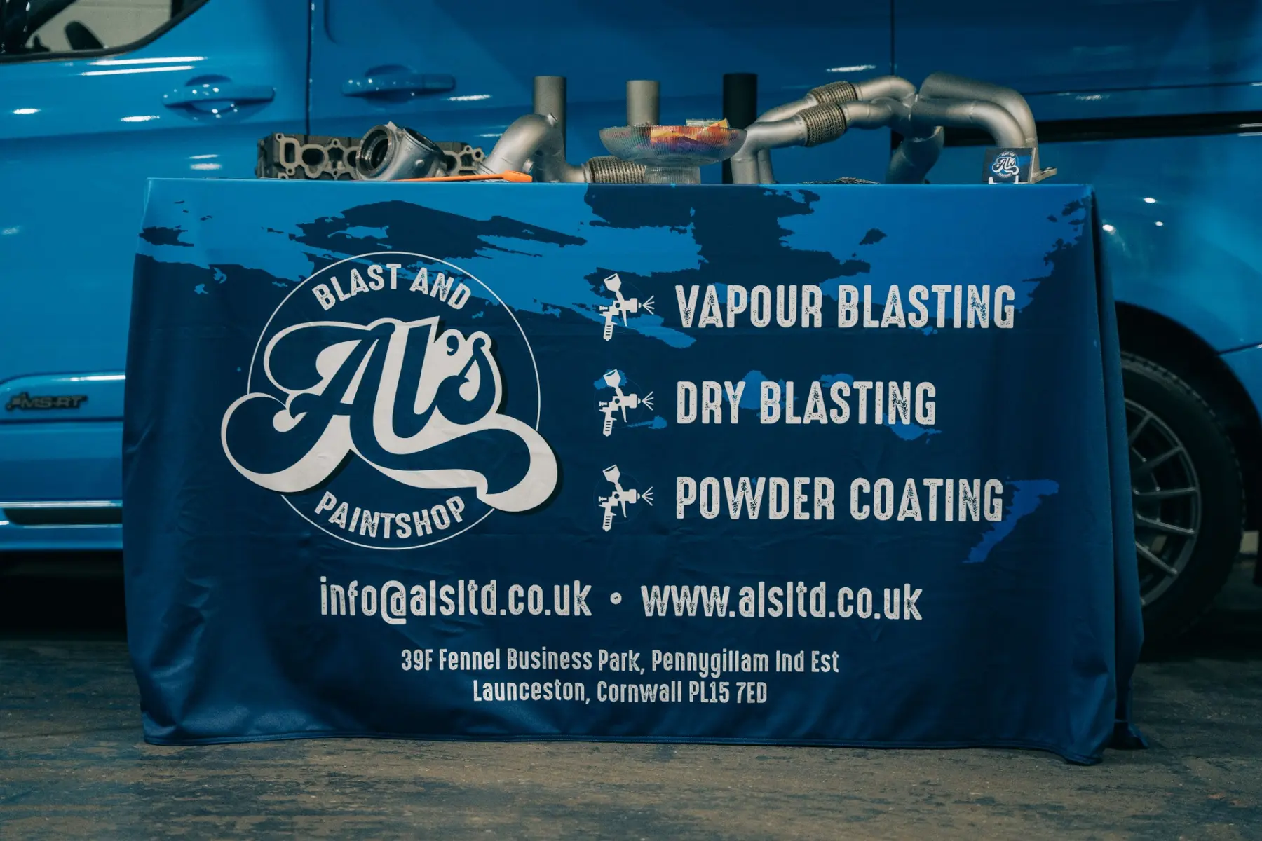 AL's branded event display with finished automotive components